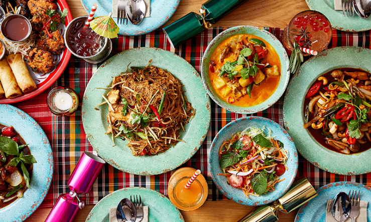 Rosa's Thai festive feast laid out on table with festive crackers