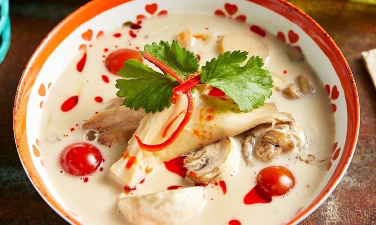 Rosa's Thai tomka served in a red patterned bowl