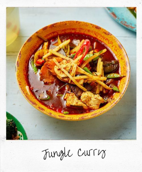 Jungle curry with chicken in yellow bowl