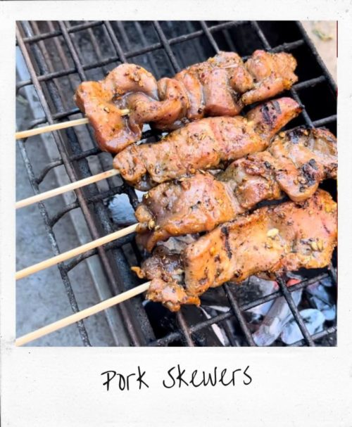 Pork skewers on grill