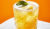 Thai inspired cocktail pineapple lime sour on orange background